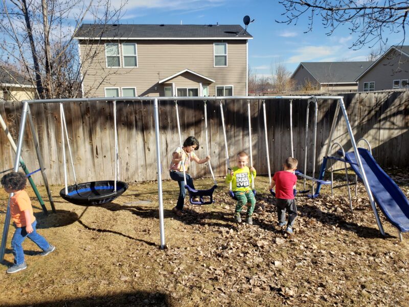Children playing outside in the yard